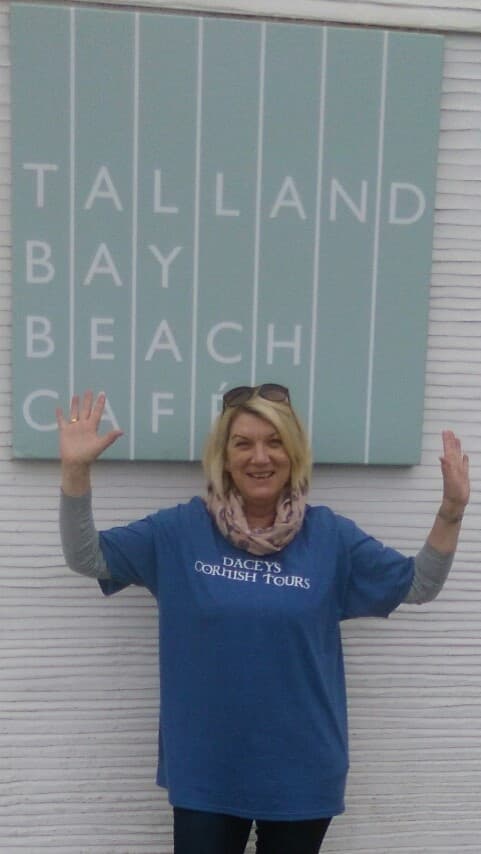 Jan,Talland having a drink at Beach, Cornwall