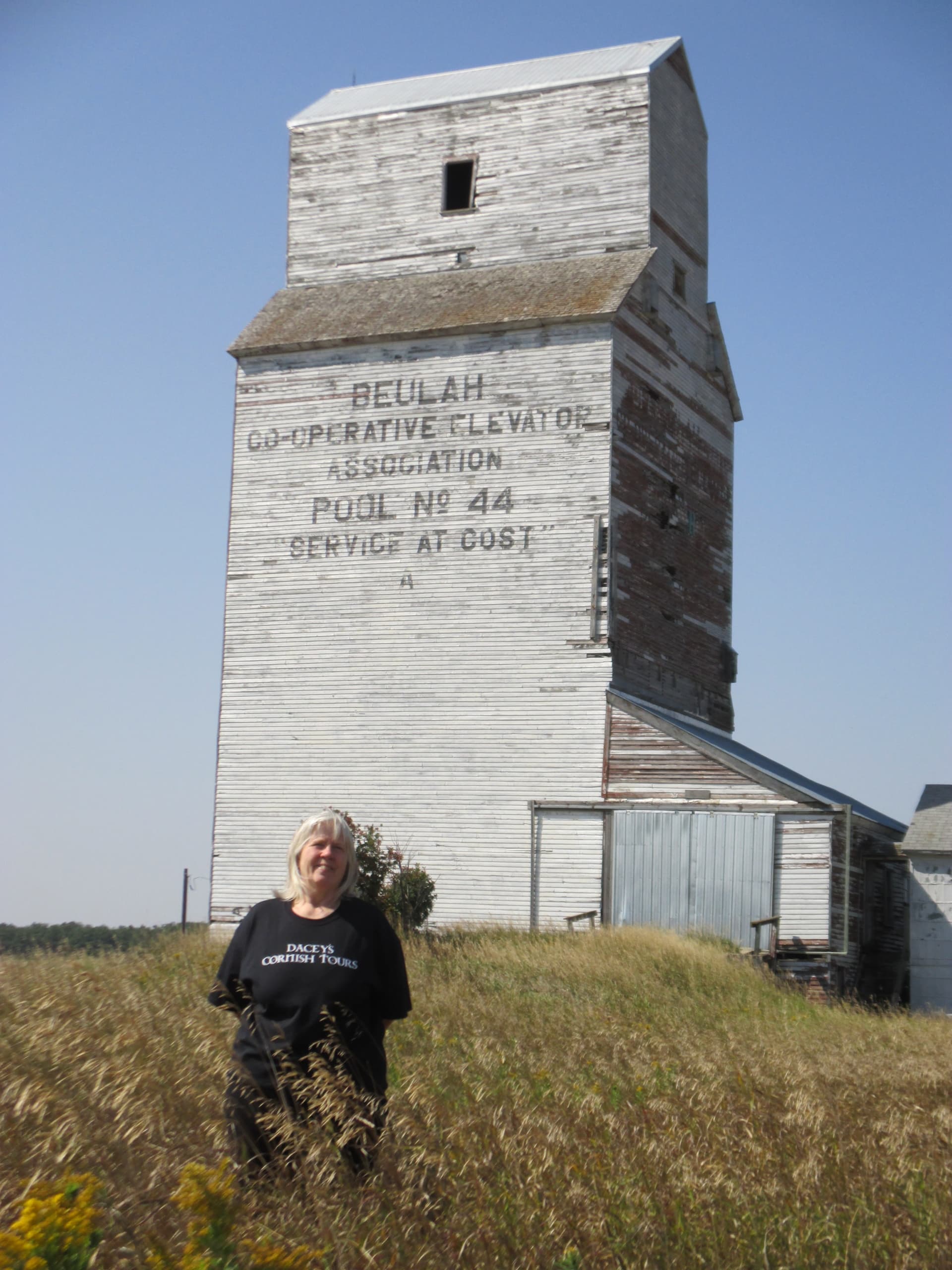 Susan, standing Beulah's Grain Elevator, Canada