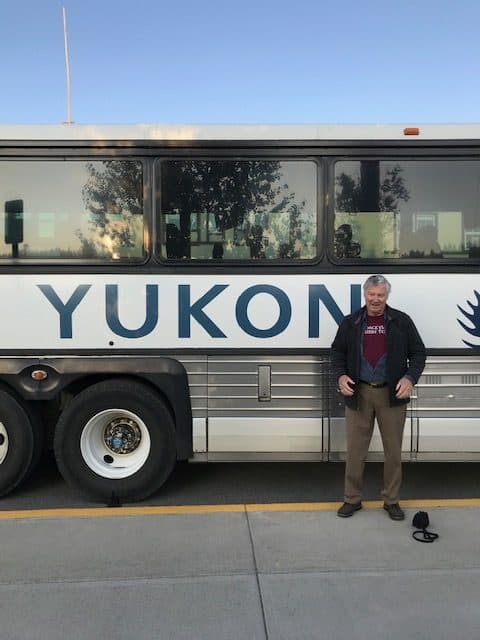 Doug, Whitehorse waiting for the bus at Yukon, Canada