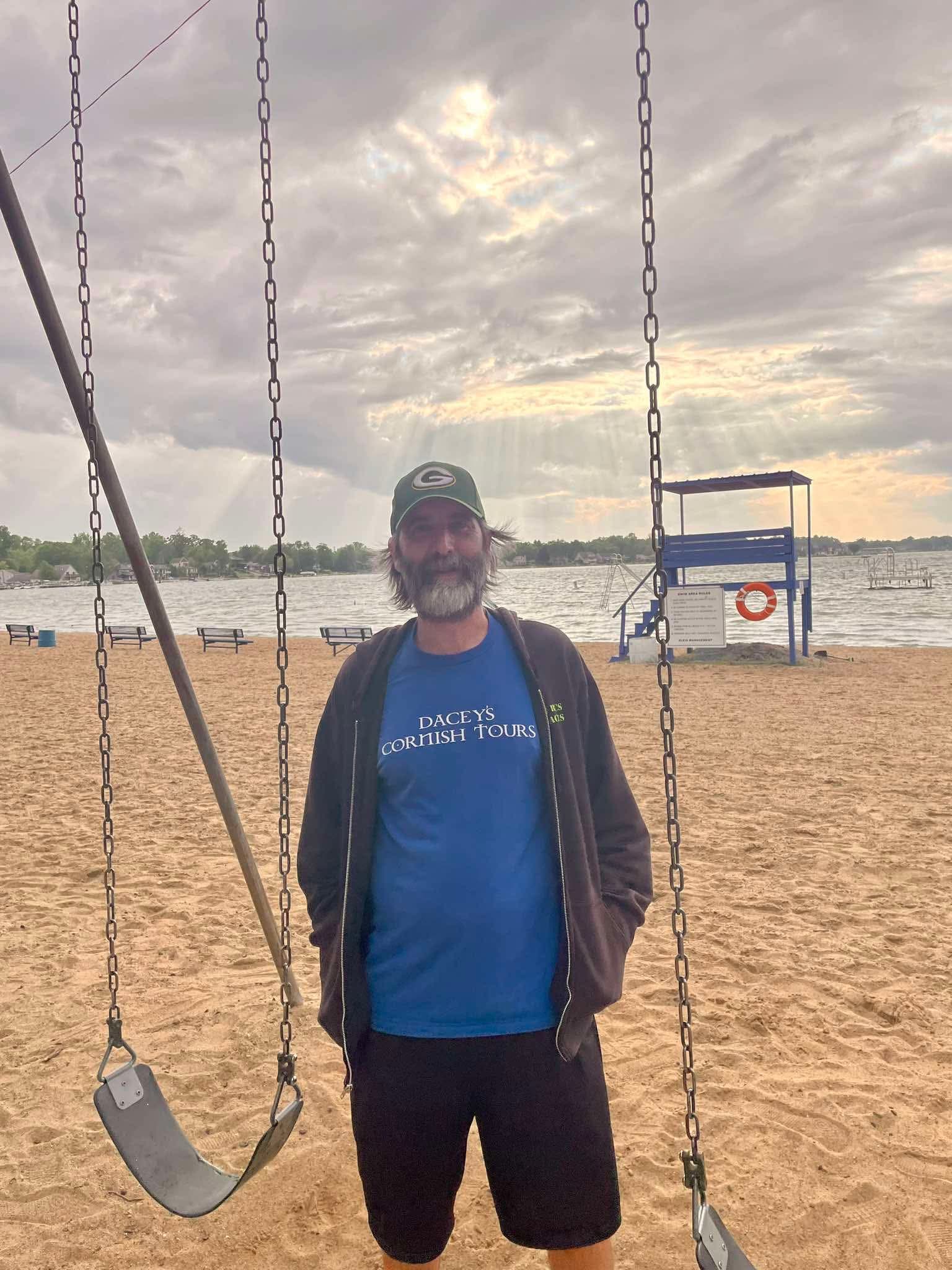 Chris wearing is Dacey's shirt on the beach Michigan