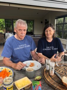 Dacey's Cornish toursJohn & Margaret eating dinner on Cook Island, New Zealand
